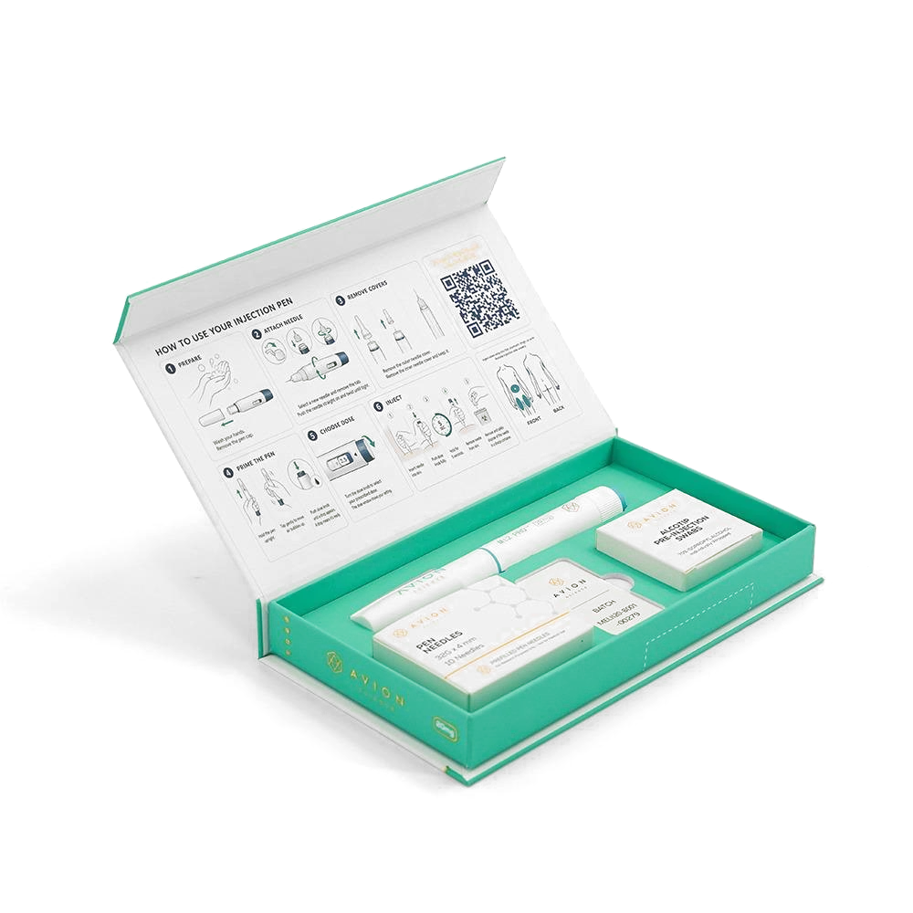 Open MT2 PRO kit: printed guide and QR code inside the lid, pen, needles, swabs and batch label in the tray